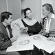 Left to right: Bud Westmore, Milicent Patrick, and Errol Flynn on the set of Against All Flags, 1952